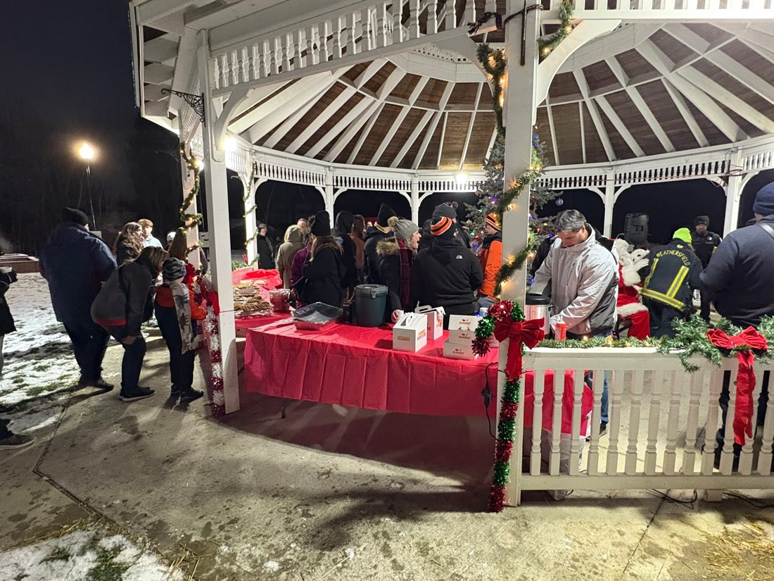 Neighbors gathered at the gazebo for the Christmas Tree Lighting